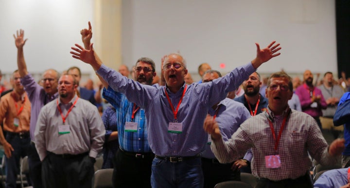 Messengers at the Southern Baptist Convention meeting in Dallas sing after a sermon by current President Steve Gaines on Tuesday.