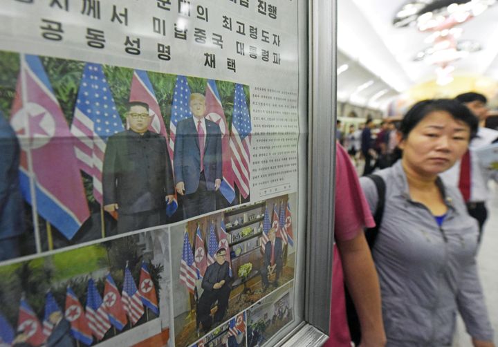 A North Korean newspaper reporting the summit between the U.S. and North Korea is displayed at a subway station in Pyongyang, North Korea.
