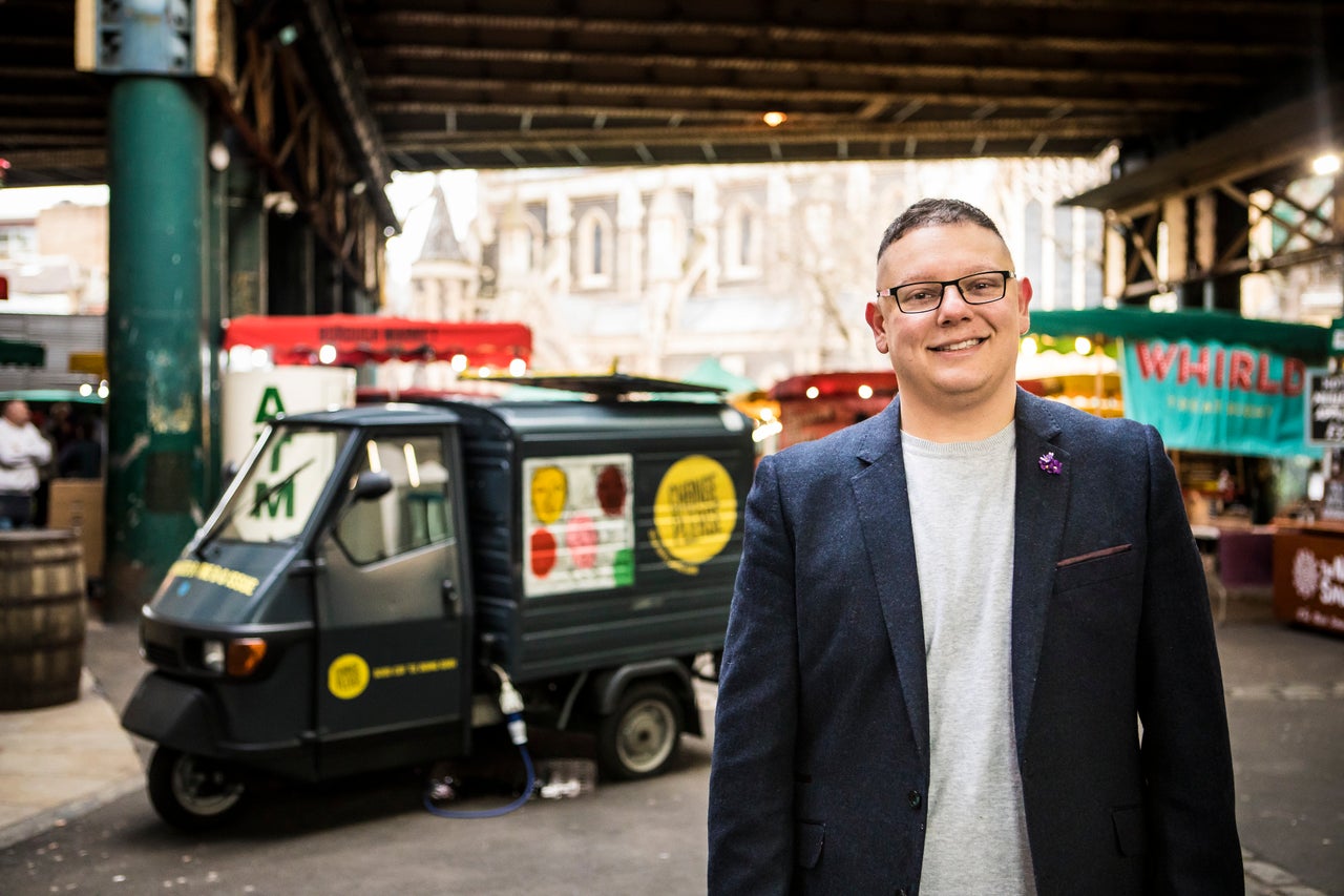 Cemal Ezel, the founder of Change Please next to one of his vans in London, U.K.