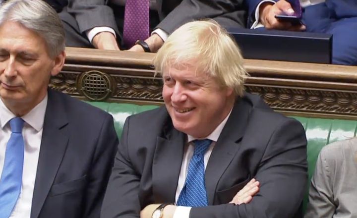 Boris Johnson chuckles as Jeremy Corbyn makes fun of Tory divisions on Brexit.
