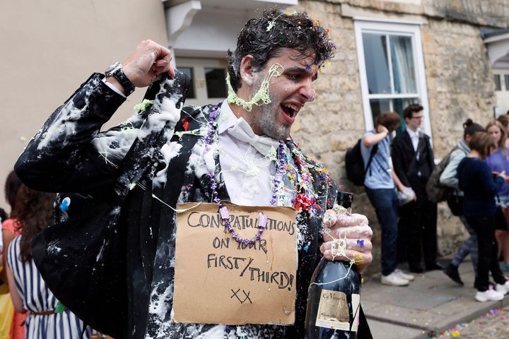 A student from University College Oxford gets 'trashed' after finishing his exams.