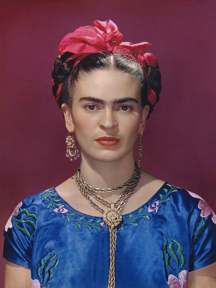 Frida Kahlo in blue satin blouse, 1939.
