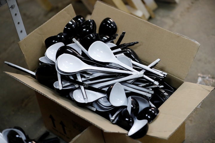 Spoons branded "Spoons of Victory", Russia's official instrument for the 2018 FIFA World Cup, are being prepared for coloring at a workshop.