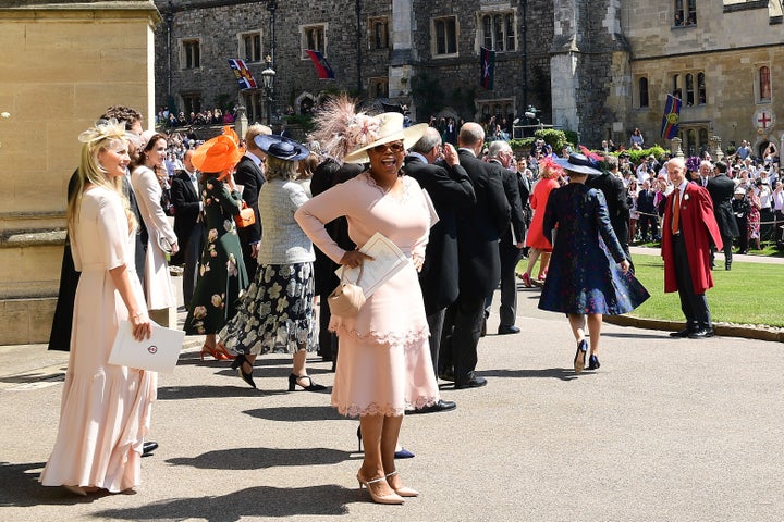 Oprah Winfrey leaves St George's Chapel at Windsor Castle after the wedding of Meghan Markle and Prince Harry.