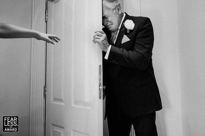 This tear-jerking moment was captured by London photographer Sam Docker.