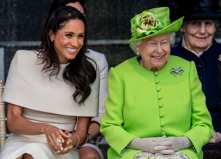 Queen Elizabeth II and Meghan, Duchess of Sussex, during a visit to the Catalyst Museum in Widnes, England, on June 14.