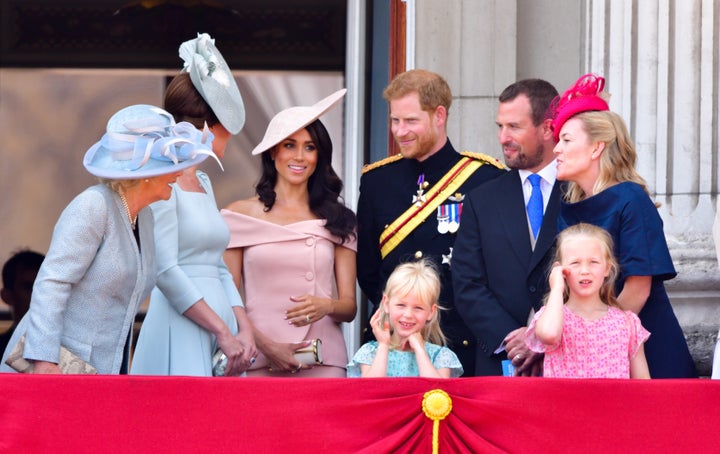 The royal family stand on the balcony of Buckingham Palace during the Trooping the Colour parade on June 9.