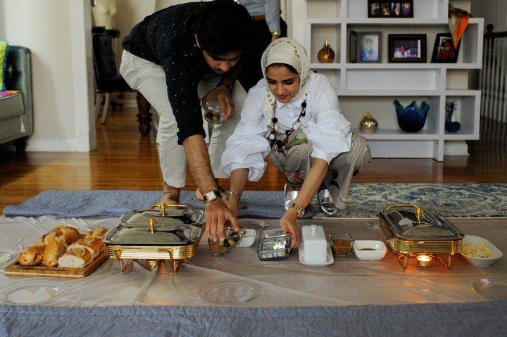 A Yemeni-American Muslim family prepares a breakfast feast to celebrate the Eid al-Fitr holiday in Brooklyn, New York, U.S., on June 25, 2017.