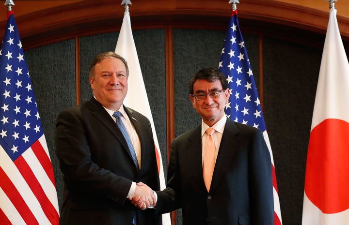 Secretary of State Mike Pompeo shakes hands with Japanese Foreign Minister Taro Kono before their meeting at South Korea's foreign ministry on June 14.