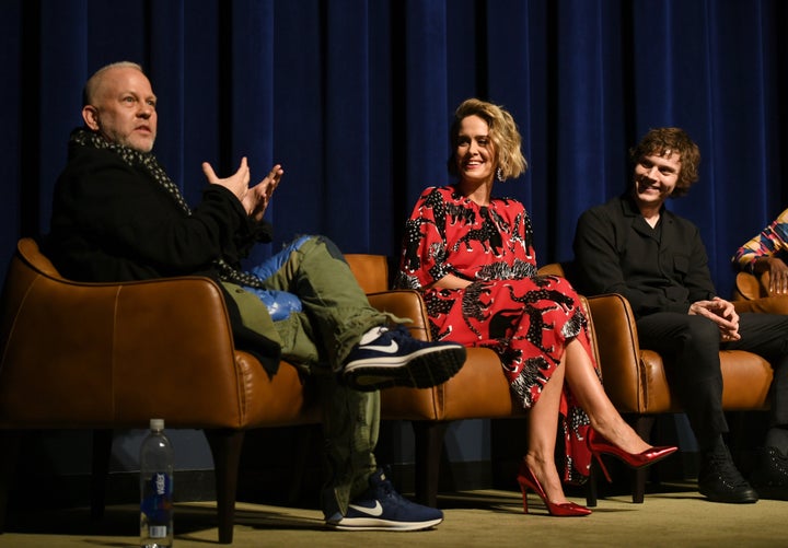 Ryan Murphy, Sarah Paulson and Evan Peters speak onstage at an "American Horror Story" event in April.