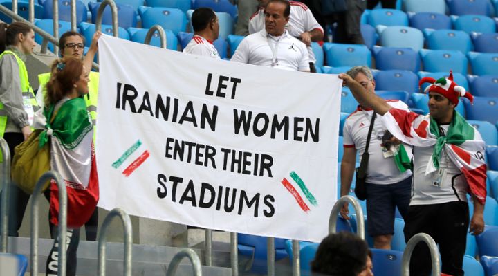 Iranian fans protest against the country's ban on women attending matches at home during the World Cup in Russia