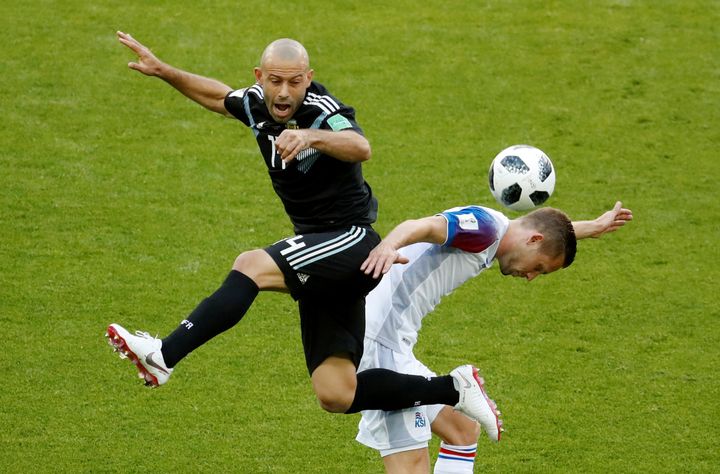 Argentina's Javier Mascherano in action with Iceland's Gylfi Sigurdsson.