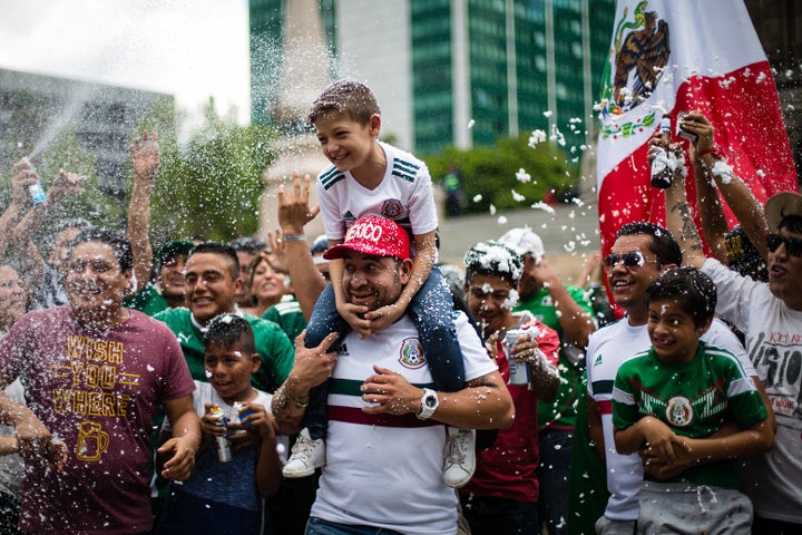 Mexicans celebrate at the Angel of Independence in Mexico City.