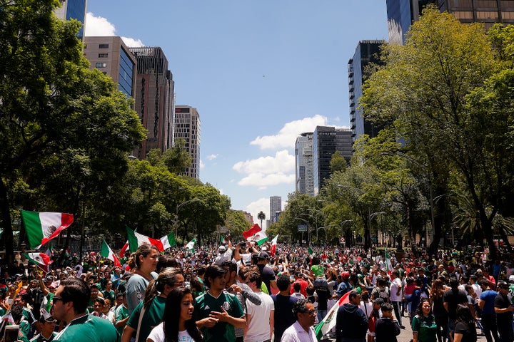 Crowds gathered to celebrate the World Cup team defeating defending champions in their first game of the competition.