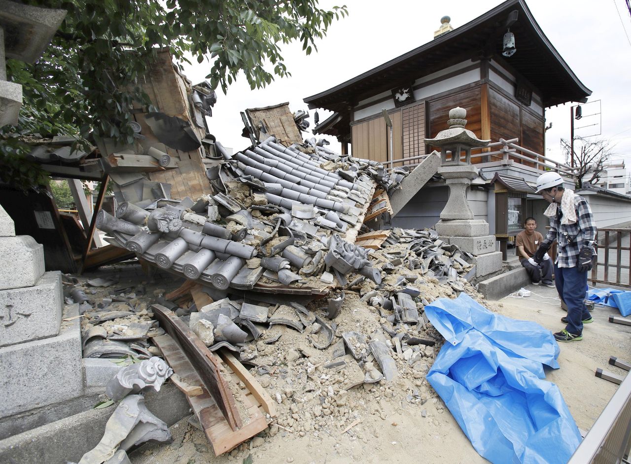The Myotoku-ji temple was damaged by an earthquake on Monday in Ibaraki, Osaka prefecture.