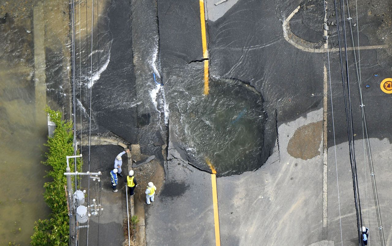 The quake damaged a road in Takatsuki, Osaka.