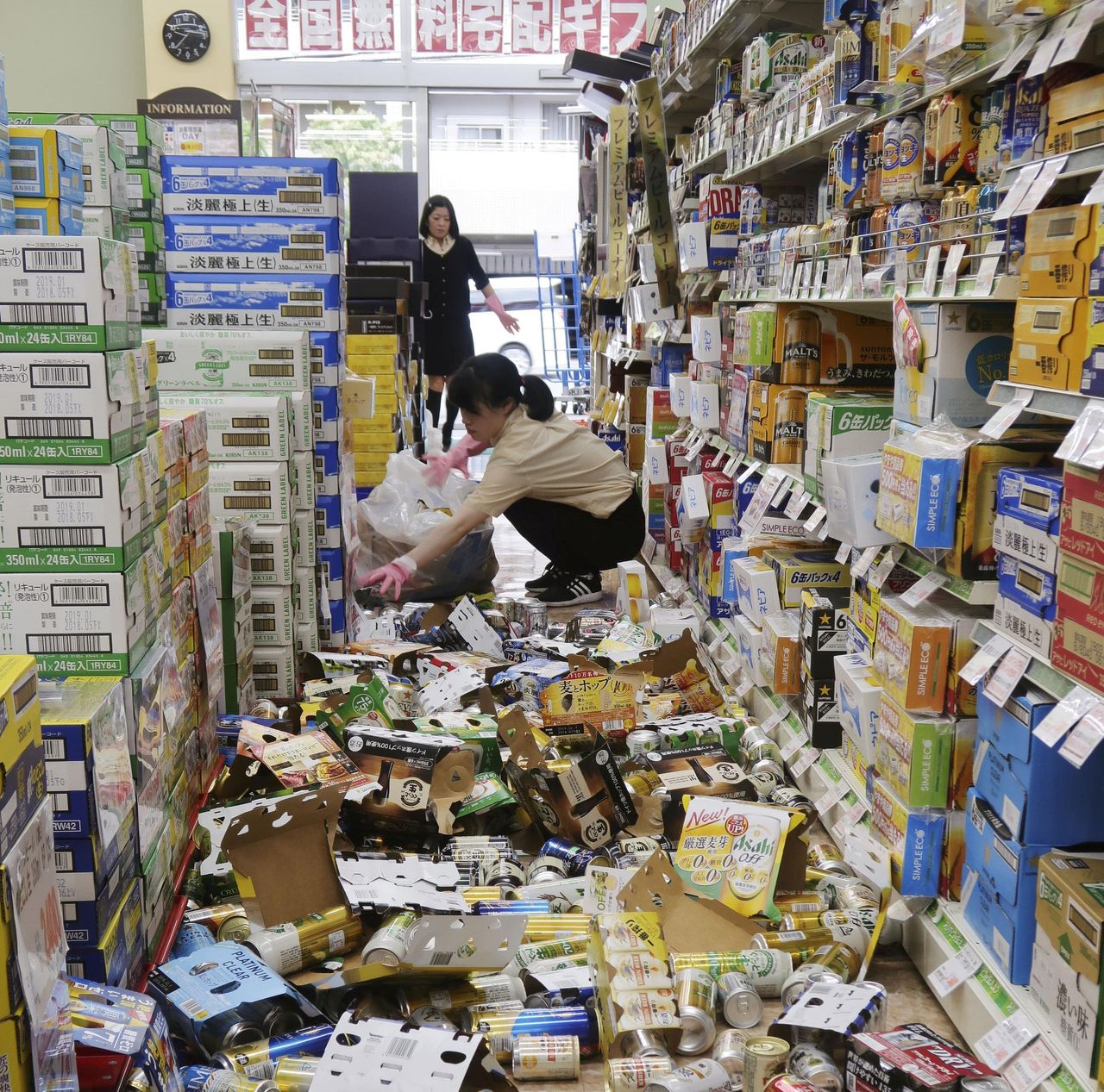 Bottles of alcohol went flying inside a liquor store in Hirakata during the temblor on Monday.