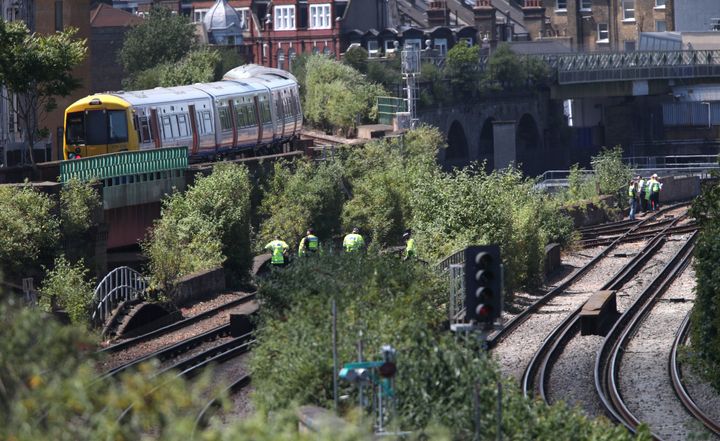 Police at the scene of the accident today at Loughborough junction in south London