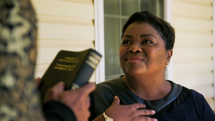 A touching moment between Karamo Brown and Tammye Hicks, in which he gives her a Bible inscribed with her sister's and mother