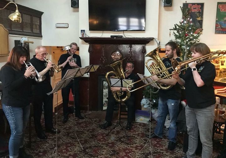 Rosie (pictured right) playing with her brass group.