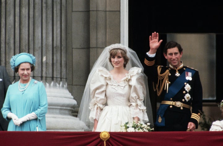 Newlyweds Prince Charles and Lady Diana with Queen Elizabeth at Buckingham Palace after the ceremony.