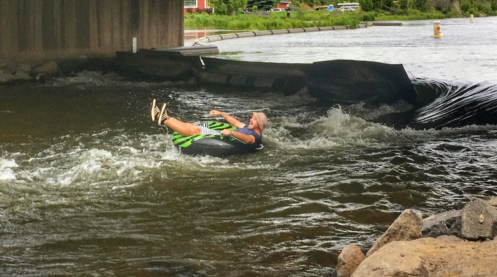 Mitch tubing down the Deschutes River in Bend, Oregon.