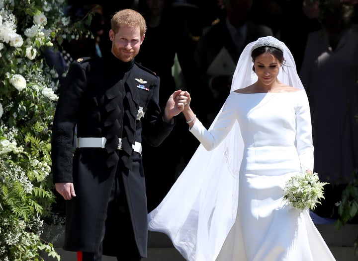 Prince Harry, Duke of Sussex, and Meghan, Duchess of Sussex, depart after their wedding ceremony at St. George's Chapel at Windsor Castle on May 19, 2018.