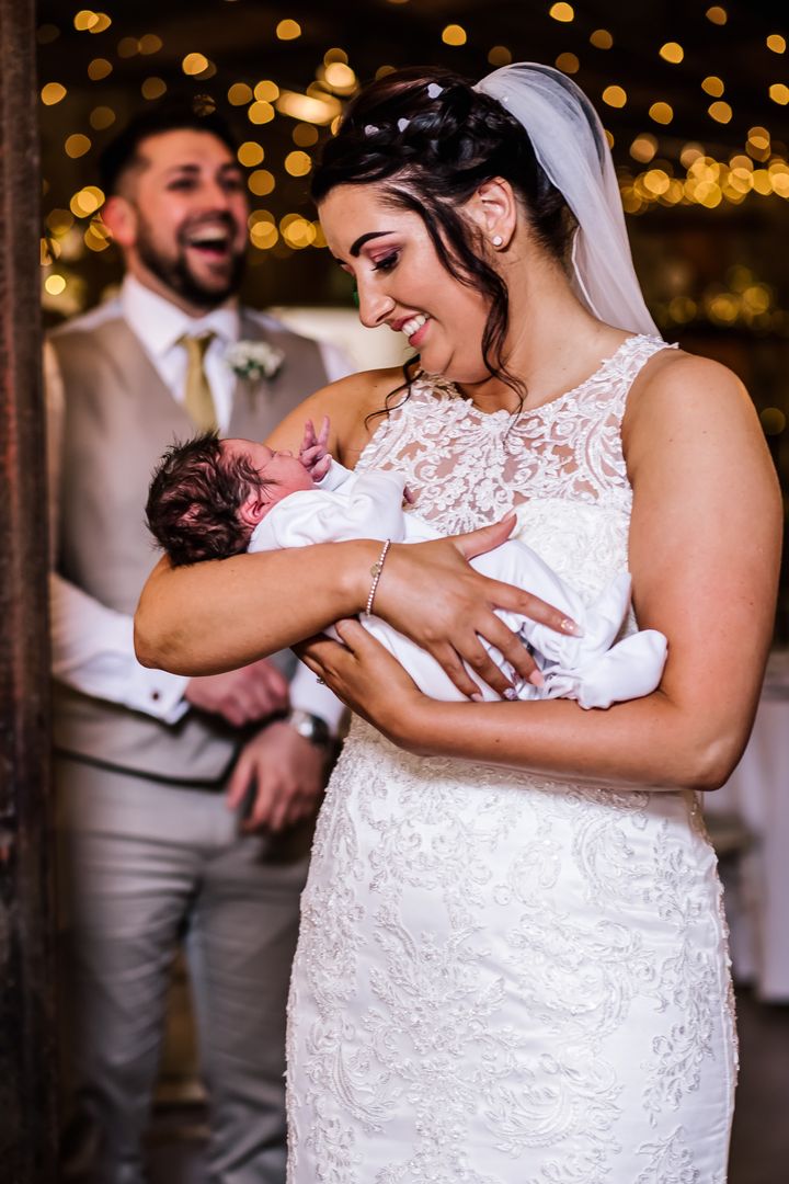 Bride Katie with her newborn nephew Brody.