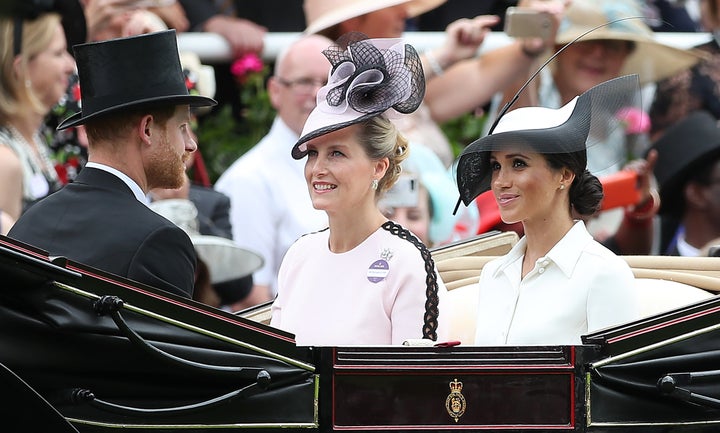 The Duke and Duchess of Sussex arrive alongside Sophie, Countess of Wessex.
