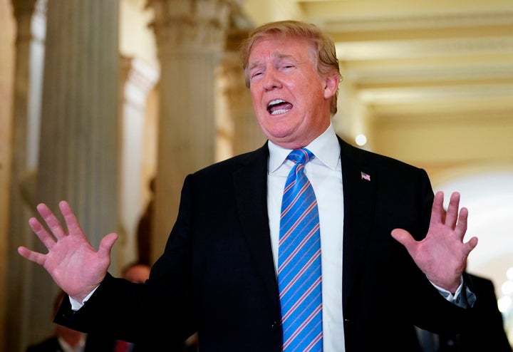 President Donald Trump talks to the press after a meeting Tuesday at the Capitol with the House Republican Conference.