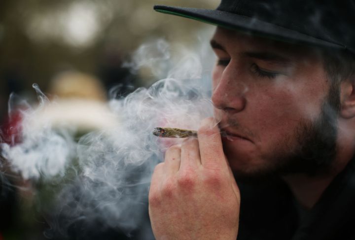 The Police Federation have called for a change in drugs laws; a man is pictured smoking cannabis above during a 420 celebration in west London