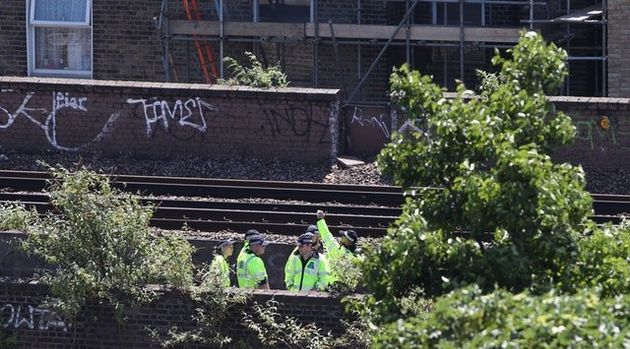 The bodies were found on the railway between Brixton and Denmark Hill 