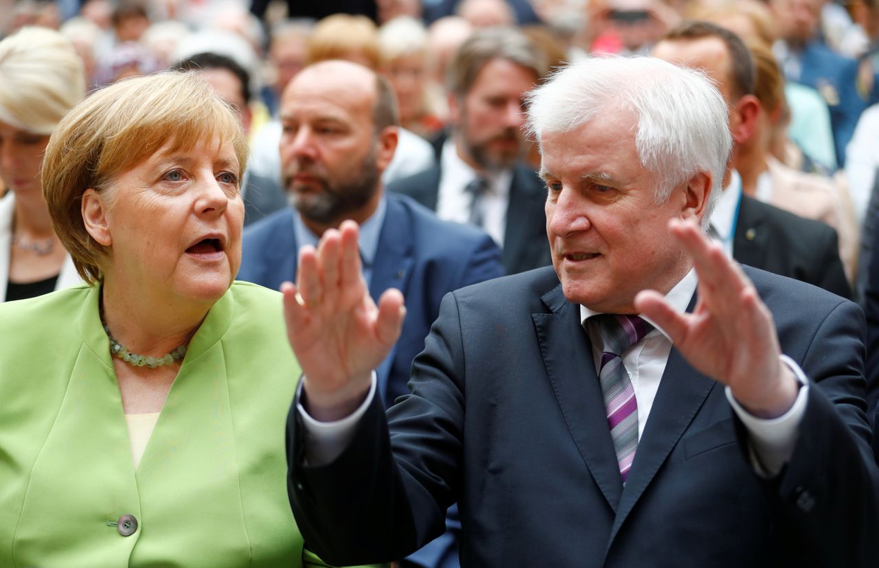 German Chancellor Angela Merkel and German Interior minister Horst Seehofer are at odds over the Germany's immigration policies.