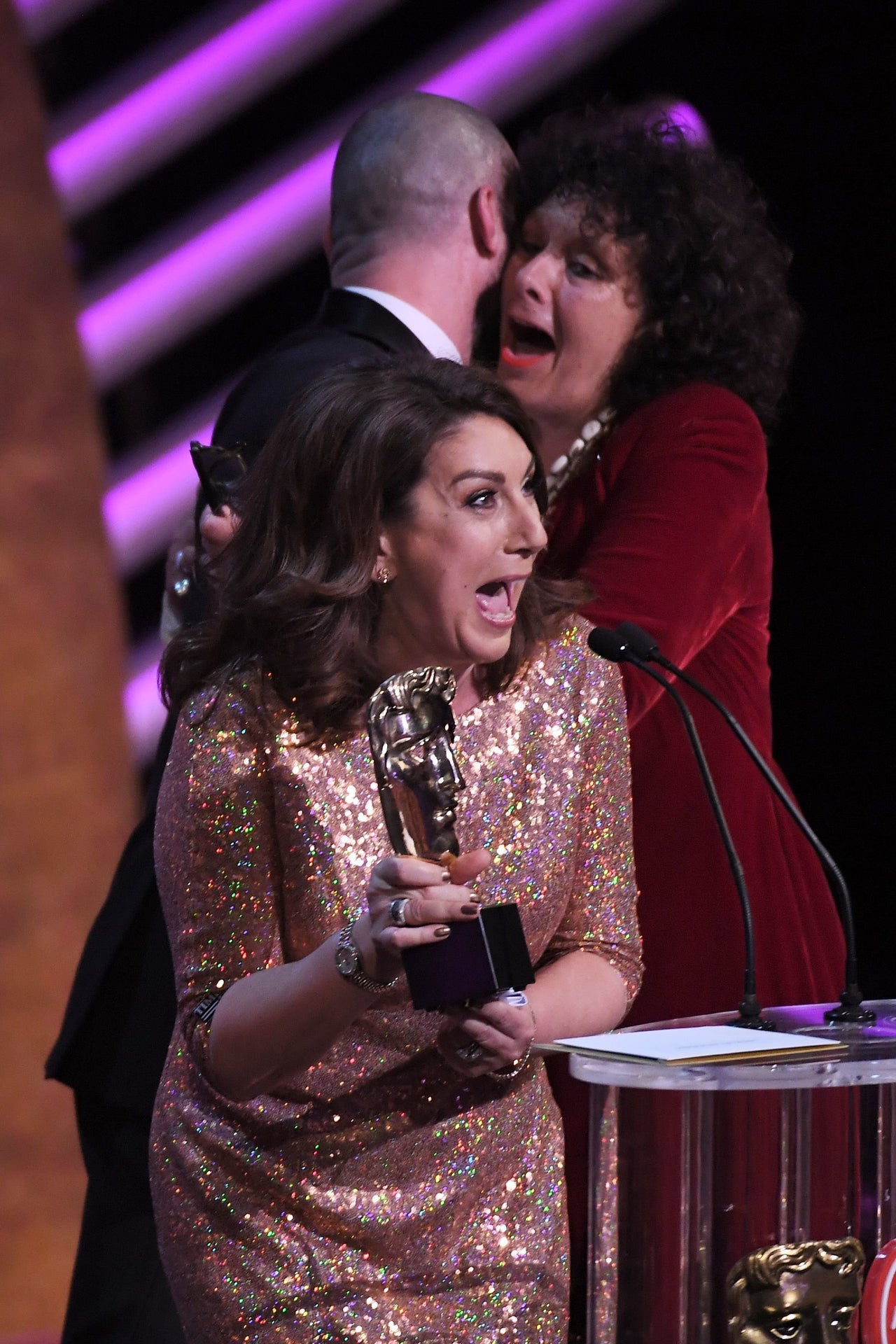 An excited Jane accepts his award