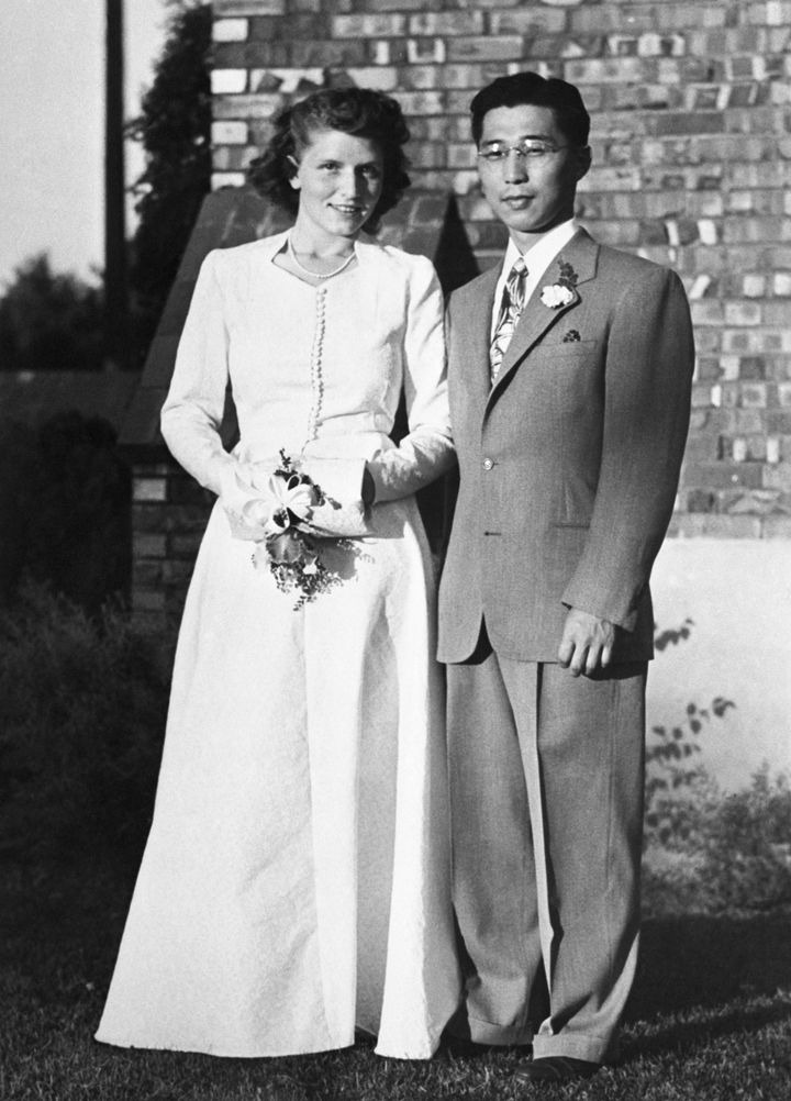 Gordon K. Hirabayashi and his bride, Esther Schmoe, after their Quaker wedding ceremony in Spokane, Washington. Both were students at the University of Washington. Hirabayashi made history as one of the Japanese-Americans who defied the U.S. Government's order of evacuation to concentration camps in 1942.