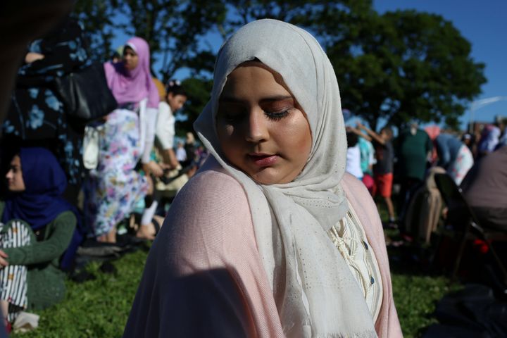 A Muslim woman prays at Bensonhurst Park to celebrate Eid al-Fitr in Brooklyn on June 15.