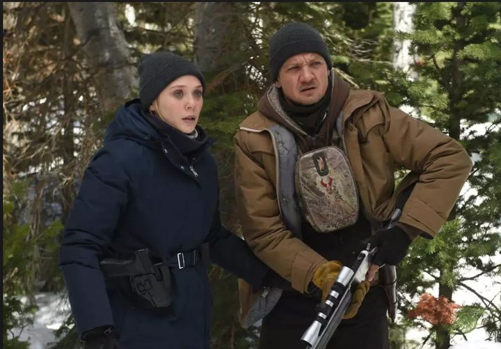 Elizabeth Olsen and Jeremy Renner star in Wind River, above