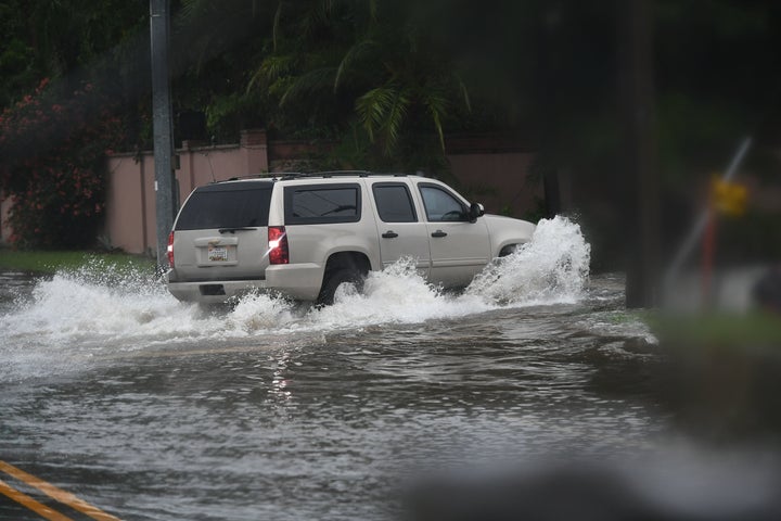 The motorcade of U.S. First Lady Melania Trump moves through a downpour en route from McAllen Miller International Airport to the Luthern Social Services of the South's Upbring New Hope Children Center in McAllen, Texas, June 21, 2018.