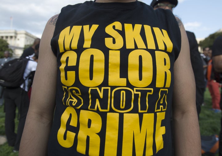 Demonstrators with the group Justice League NYC and others participate in a March2Justice rally for criminal justice reform legislation to end racial profiling and demilitarize police forces. 