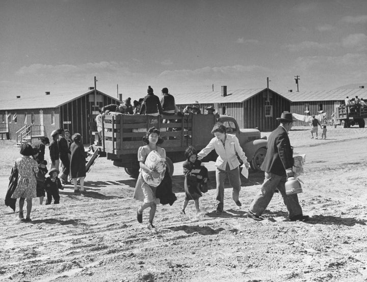 Japanese-American families arrive at Heart Mountain in Wyoming during World War II.