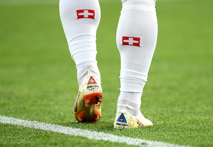 The Kosovo flag is seen on Xherdan Shaqiri of Switzerland's boots during the 2018 FIFA World Cup Russia group E match between Serbia and Switzerland at Kaliningrad Stadium on Friday in Kaliningrad, Russia.