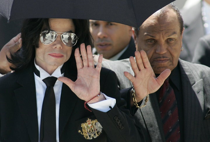 Michael Jackson and father Joe leave the Santa Barbara County courts after Michael was acquitted on all 10 charges in his child molestation trial in 2005.