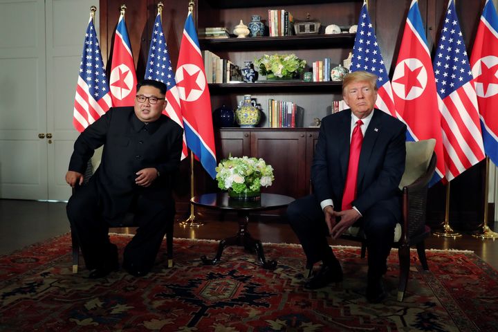 US President Donald Trump and North Korea's leader Kim Jong Un meet in a one-on-one bilateral session at the start of their summit at the Capella Hotel on the resort island of Sentosa, Singapore June 12, 2018.