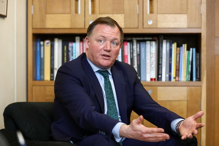 Tory MP Damian Collins has called for homophobic abuse to be treated the same way as racist abuse at football grounds 