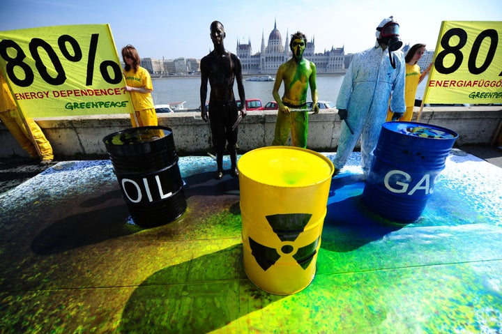 Greenpeace activists protest opposite the Hungarian parliament building in Budapest in April 2014. After the government signed a treaty with Russia to build two new blocks of a nuclear power plant, the dependence of the country's electric energy production rose to almost 80 percent.