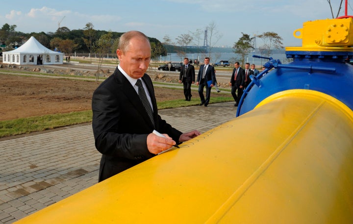 Russia's prime minister Vladimir Putin leaves his signature on a gas pipeline in Vladivostok, Russia, September 2011.