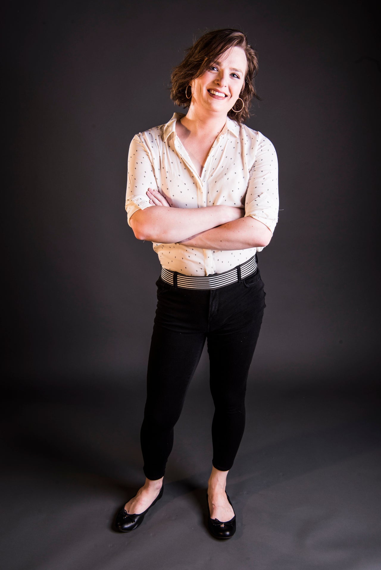 "No one has ever known me as anyone but Stella at my current job, so I got to build my work wardrobe from the ground up with no preconceptions. A sheer top is a classic, vaguely sexy business-casual look, and some stealth jeggings and ballet flats keep me super comfy from 9 to 5. As with casual looks, I recommend high-waisted bottoms if you can get them!"