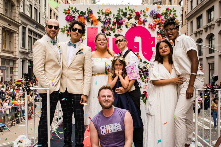 "Queer Eye" star Bobby Berk said he hoped to "give back to [the LGBTQ] community" by officiating the weddings of three same-sex couples during New York City's Pride parade. 