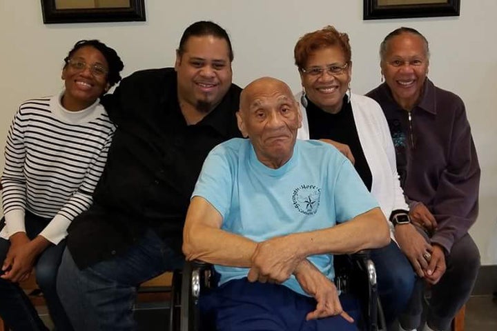 Kenneth Bowser (center) visits with (from left) grandchildren Tonya Cotton and Mark Cotton and daughters Sharon Van Leer and