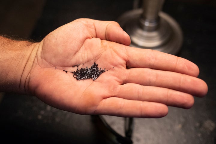 Holtzman shows the contents of a cartridge containing rat shot. 